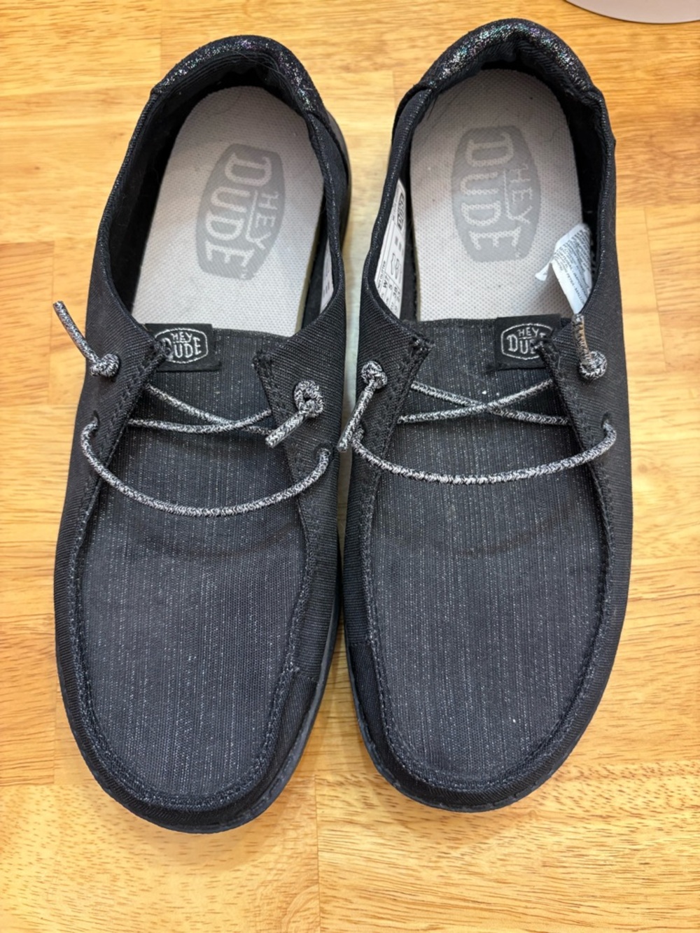 Hey Dude women’s Black Slip-On Boat Shoes